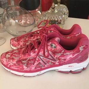 Women’s pink camouflage New Balance running shoes.